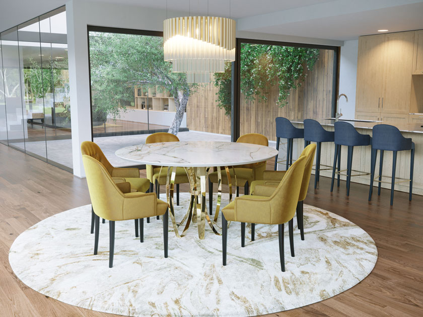 Image description: Round dining table with gold stainless steel base and marble-like ceramic top.