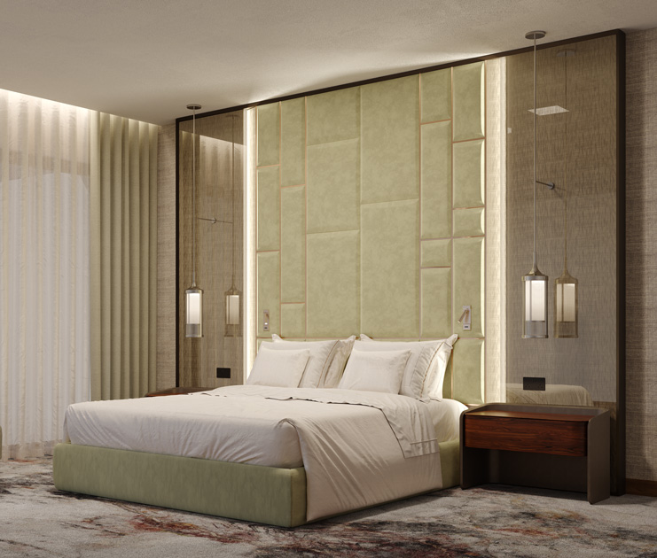 Image description: hotel bedroom with bed upholstered in light green, beside tables and bedding