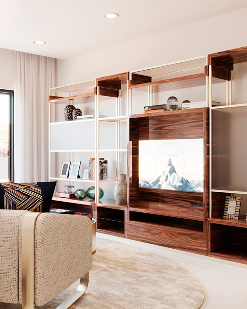 Image description: 2022 interior design trend, bookcase in polished gold stainless steel and ironwood.